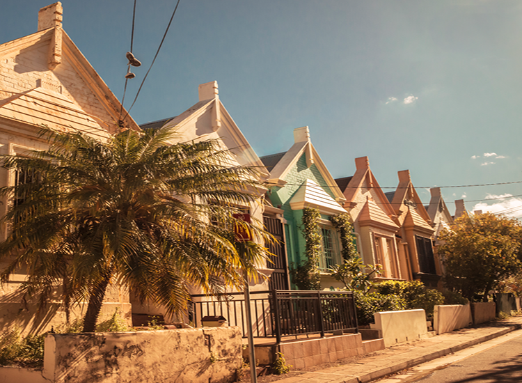 image of row of workers cottages in the sun